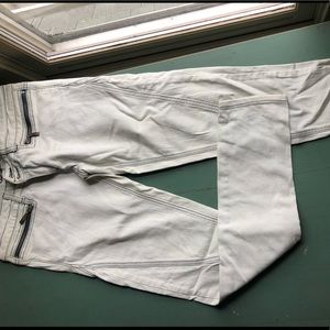 Acid wash skinny jeans with unique zippers